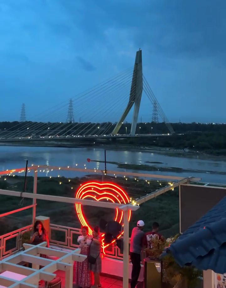 The Signature Bridge seen from our rooftop at dusk